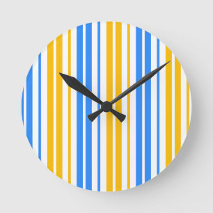 Horloge Ronde Motif à rayures verticales jaunes bleues et blanch