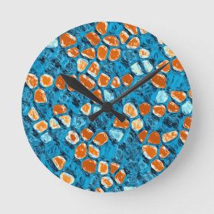 Horloge Ronde Motif Abstrait orange et bleu
