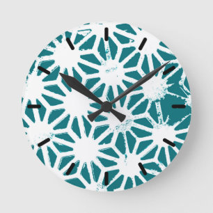 Horloge Ronde motif géométrique turquoise et blanc