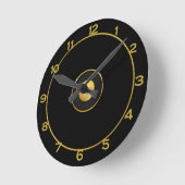 Horloge ronde noire et or (Angle)