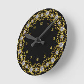 Horloge ronde noire et or (Angle)