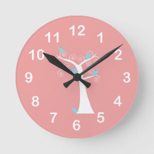 Horloge Ronde Oiseaux bleus Fond rose Arbre fantaisiste