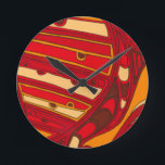 Horloge Ronde Panneaux orange Abstraits<br><div class="desc">Un rêve surréaliste,  ces panneaux orange abstraits aux couleurs vives ressemblent à de la cire fondue qui coule à travers une toile. Création de Jennifer Goldberger,  cette oeuvre est extraordinaire dans son utilisation imaginative de la couleur et des lignes. Commandez les vôtres dès aujourd'hui !</div>