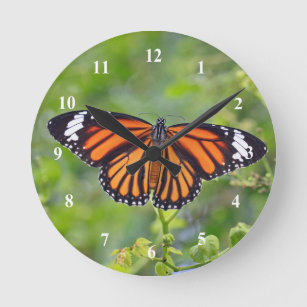 Horloge Ronde Papillon à rayures orange