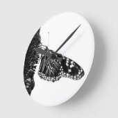 Horloge Ronde papillon timide blacq (Angle)