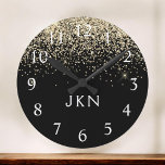 Horloge Ronde Parties scintillant Noir Or Monogramme Initiales F<br><div class="desc">Parties scintillant à étincelle noire et or brossé Monogramme Nom Horloge. Cela rend le cadeau parfait pour 16 ans,  mariage,  douche nuptiale,  anniversaire,  baby shower ou bachelorette pour quelqu'un qui aime le luxe glam et les styles chic.</div>