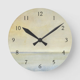 Horloge Ronde Paysage marin avec le coucher du soleil orange