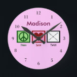 Horloge Ronde Peace Love Baton Twirling Custom Pink<br><div class="desc">Un signe de paix,  un coeur,  et des bâtons qui tourbillonnent. Peace Love Twirl horloge personnalisée.</div>