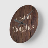 Horloge Ronde Perdu dans ses pensées (Angle)