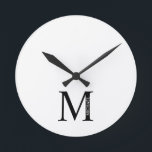 Horloge Ronde Personnalized Monogram and Name Round Clock<br><div class="desc">Monogramme et nom personnalisés Designfeatures personnalisé monogramme et nom dans le style de police serif classique.</div>