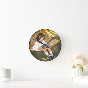 Horloge Ronde Petite fille lisant dans un hamac