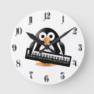 Horloge Ronde Pingouin avec piano
