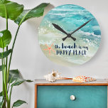 Horloge Ronde Plage Joyeux Lieu Aquarelle Océan Vagues Côtier<br><div class="desc">Créez une ambiance de vacances en bord de mer avec cette horloge murale côtière cool avec aquarelle tropicale turquoise et des vagues océaniques de la mer,  l'étoile de corail et "la plage est mon endroit heureux" légende dans une écriture marine bleu marine. Art par KL Stock</div>