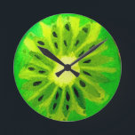Horloge Ronde Pop art vif kiwi fruit original aquarelle<br><div class="desc">Une jolie tranche de fruits de kiwi colorée et vibrante d'un tableau original de Sacha Grossel. Ce grand fruit de style pop art est vert et très lumineux et coloré contre un arrière - plan de couleur jaune personnalisable. Excentrique et original.</div>