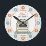 Horloge Ronde Rétro Stove Personalized Kitchen Clock<br><div class="desc">A clock featuring an illustration of a retro beige kitchen stove.  Personalize with your name about illustration.  Clock feobjets white numbers on orange and blue dots.</div>
