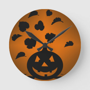 Horloge Ronde Silhouette de citrouille et de feuilles