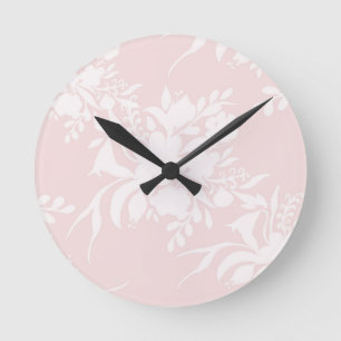 Horloge Ronde Silhouette florale motif dans les tons roses