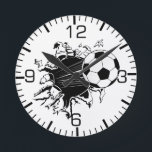 Horloge Ronde Soccer Ball Busting Out<br><div class="desc">Soccer Ball illustration bursting out of shirts and merchandise. You can change the background color to your favorite Soccer team and you can also personalize it.</div>