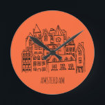 Horloge Ronde Souvenir orange d'Amsterdam Netherlands<br><div class="desc">Amsterdam is the capital and most populous municipality of the Kingdom of the Netherlands. Les meilleurs souvenirs sont toxiques. Holland attracks a lot of tourts every year. Have you not visited the beautiful city Amsterdam yet. Parfait pour Amsterdam,  Hollande.</div>
