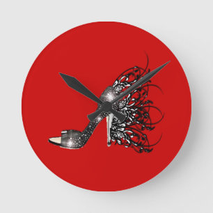 Horloge Ronde Stylet noir de scintillement sur le rouge