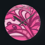 Horloge Ronde Tableau Abstrait à panneau rose<br><div class="desc">Impression dalienne,  cette peinture rose abstraite de Tina Kafantaris présente des lignes tordues et fondues segmentées en trois panneaux. Une impression surréaliste et dynamique qui se rapprocherait d'un grand nombre de produits. Commandez aujourd'hui !</div>