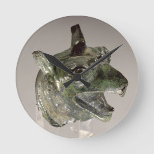 Horloge Ronde Tête de griffon, fragment d'un attachement de