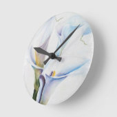 HORLOGE RONDE TROIS MENSONGES DE CALLA BLANCHE (Angle)