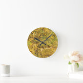 Horloge Ronde Un champ de fleurs jaunes par Vincent van Gogh (Maison)