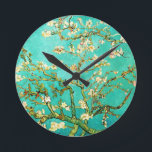 Horloge Ronde Vincent van Gogh Blossoming<br><div class="desc">Blossoming Almond Tree by Vincent van Gogh 1853-1890. Oil on canvas,  1890. Current location Van Gogh Museum d'Amsterdam.</div>