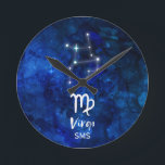Horloge Ronde Virgo Zodiac Constellation Blue Galaxy Monogram<br><div class="desc">Virgo Zodiac Constellation Blue Galaxy Monogram Design With trendy Brushed Script Font, Dark blue celestial watercolor background texture, Glowing star constellation, et The Maiden Symbole. Astrological Sign Birth Horoscope, est parfait pour tout Virgo Birthday From août 23 - septembre 22 ! With Optional Monogrammed First Middle and last name Initial...</div>