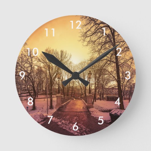 Horloge Ronde Vue panoramique du parc enneigé au coucher du sole (Recto)