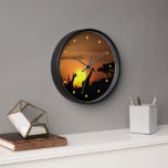 Horloge Safari Afrique coucher de soleil Giraffe Silhouett<br><div class="desc">Belle aquarelle contemporaine de girafes au coucher du soleil, aux couleurs orange et jaune vif. Fabriqué pour les amoureux de la faune et de la flore, de la nature africaine, des animaux sauvages, de la faune et de la flore, et voyageant dans des endroits exotiques et des pays du monde....</div>