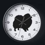 Horloge Silhouette de Poméranie avec chiffres et minutes<br><div class="desc">Une horloge murale amusante pour la maison ou le bureau. Fait un cadeau original pour les amoureux de Pom. Découvrez le Doodle World de Jenn pour encore plus d'horloges décoratives et le décor Poméranien sur le thème de la maison.</div>