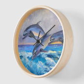 Horloge Trois dauphins sauvages jouant en eau Turquoise (Angle)