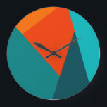 Horloge turquoise et orange<br><div class="desc">Horloge murale couleur turquoise et orange</div>