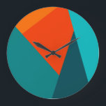 Horloge turquoise et orange<br><div class="desc">Horloge murale couleur turquoise et orange</div>