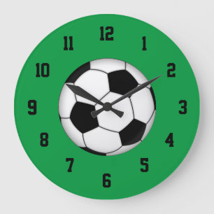 Horloge verte et noire et blanche du football