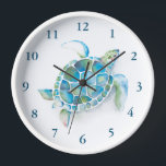 Horloges de pépinière de tortue de mer mignonne<br><div class="desc">Transformez la pépinière de votre enfant en paradis océanique avec cette adorable horloge Watercolor Sea Turtle Nursery de Victoria Grigaliunas de Do Tell A Belle. Conçue avec amour et soin, cette horloge charmante présente une jolie tortue de mer dans des tons apaisants de bleu turquoise et vert. Parfait pour les...</div>