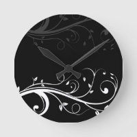 Horloges murales florales noires et blanches