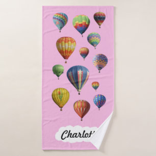 Hot-luchtballonnen op lichtroze badhanddoek