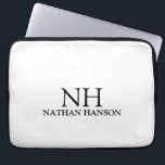 Housse Pour Ordinateur Portable Monogramme noir et blanc simple Moderne<br><div class="desc">Manche portable moderne avec un design noir et blanc simple et minimal avec votre monogramme en caractères gras avec votre nom.</div>