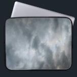 Housse Pour Ordinateur Portable Nuages de tempête en panne<br><div class="desc">Des nuages orageux foncés se détachent au premier plan de cette photo couleur. Les couches de nuages deviennent des nuances de gris plus claires et plus profondes dans l'image. Des indices de ciel bleu clair sont visibles au-delà des nuages de tempête lorsque le temps commence à s'éclaircir. Photo numérique, couleur....</div>