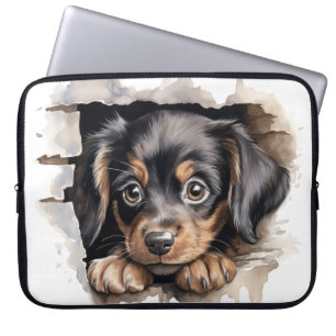 HOUSSE POUR ORDINATEUR PORTABLE PETIT CHIEN NOIR ET TONNÉ QUI SURPLOMBE LA CLÔTURE