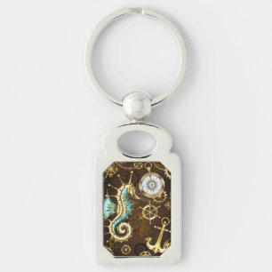 Houten achtergrond met mechanisch zeepaard sleutelhanger