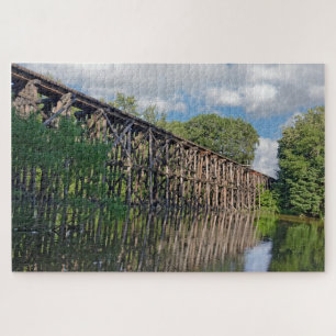 Houten spoorbrug over een rivier legpuzzel