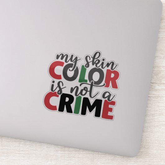 Huidkleur is geen misdaad sticker (Detail)