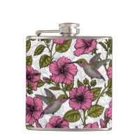 Hummingvogels en roze hibiscus bloemen