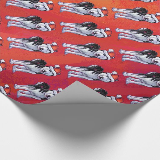 Husky in Santa Hat op Red Cadeaupapier (Hoek)