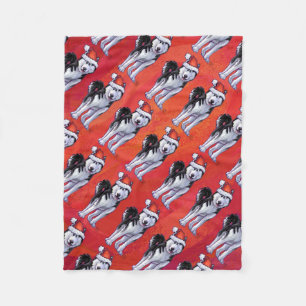 Husky in Santa Hat op Red Fleece Deken