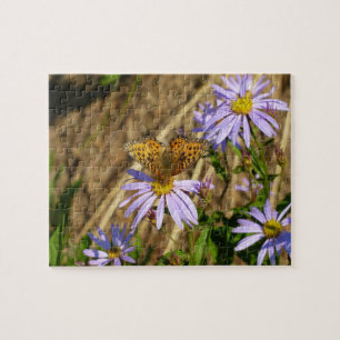 Hydaspe Fritillary op paarse Aster bloemen Legpuzzel